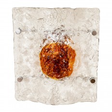 Pair of textured clear glass sconces with amber dot design